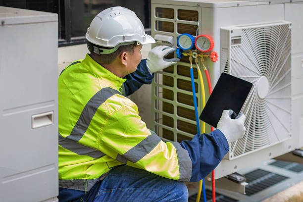Professional Heat Pump Repair technician working in Huntertown, IN